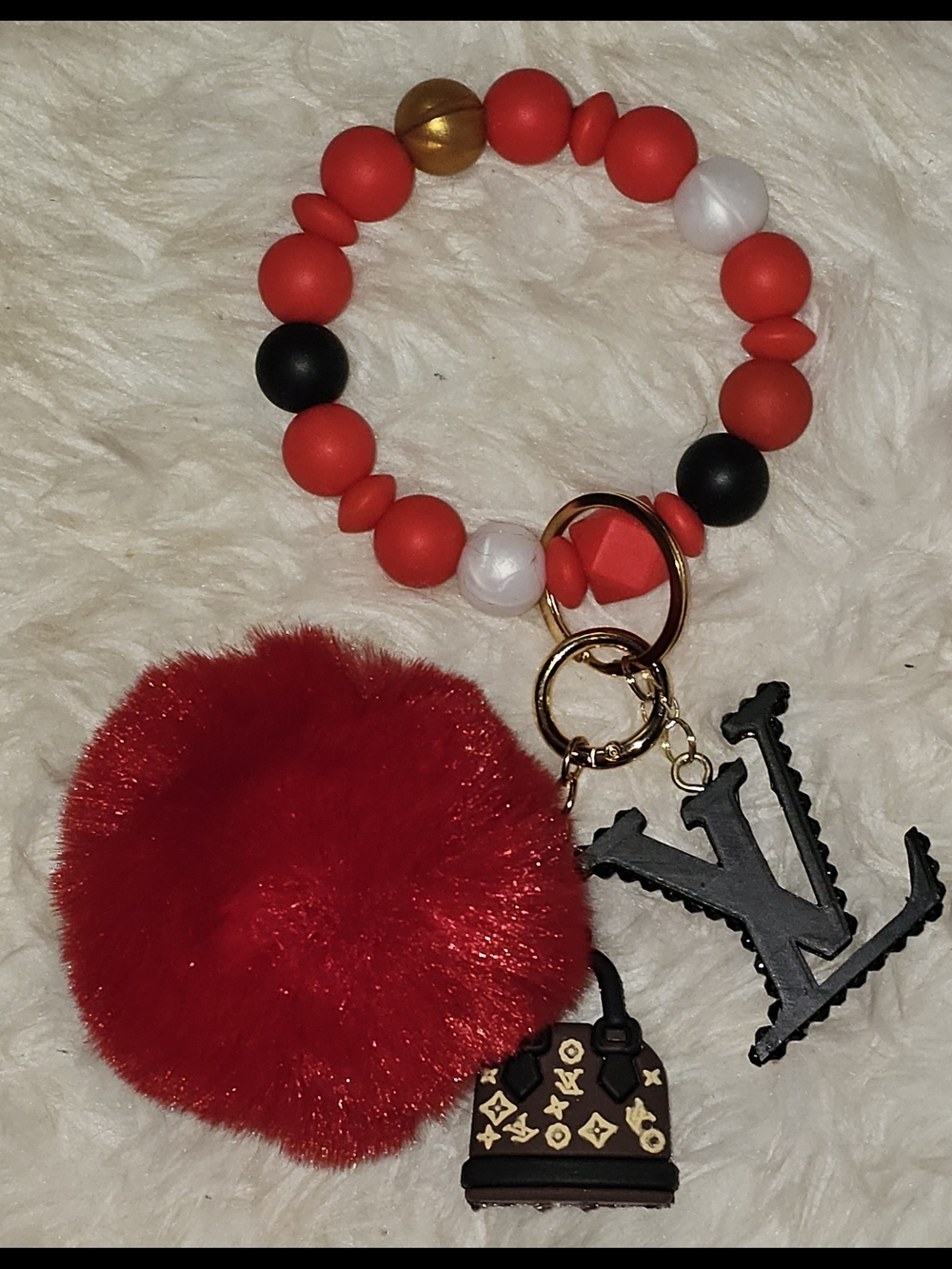 LV Wristlette. Detachable Emblem, Purse, Pom Pom And Stretchable Wristlette - Picture 2 of 8